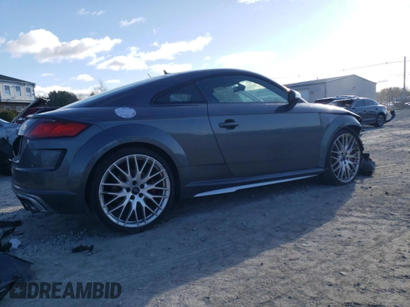 2020 Audi TTS z VIN TRUA1AFV5L1006990, wystawiony jako Copart lot #47334114 z przebiegiem 41 063 mil mil oraz . Historia ofert i sprzedaży dostępna na DreamBid. Obrazek 3.