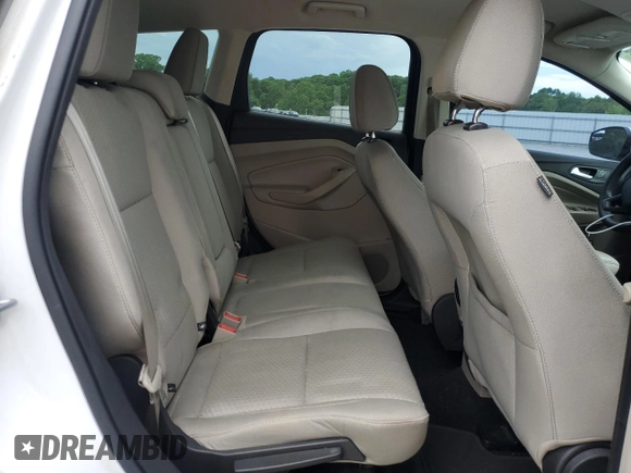 2017 Ford Escape SE z VIN 1FMCU0G99HUA75866, wystawiony jako Copart lot #57274785 z przebiegiem 132 874 mil mil oraz Czysty tytuł • Clean title. Historia ofert i sprzedaży dostępna na DreamBid. Obrazek 11.