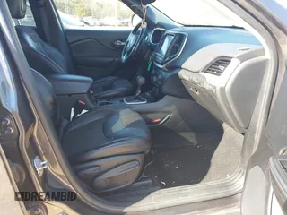 2014 Jeep Cherokee Trailhawk with VIN 1C4PJMBS6EW278987, listed as a IAAI auction lot 41789868 with 136,696 mi miles. Bid and sale history available at carsss.com. Image 5.
