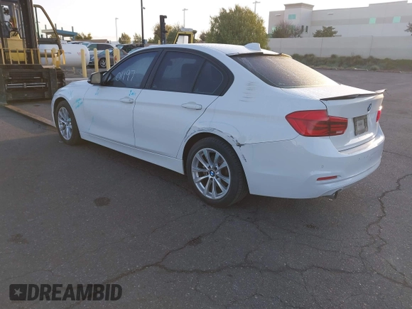 2018 BMW 3 Series 320i with VIN WBA8E1G54JNU90990, listed as a IAAI auction lot 41801197 with 140,603 mi miles. Bid and sale history available at carsss.com. Image 3.