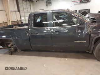 2017 GMC Sierra 1500 SLE z VIN 1GTV2MEC2HZ194077, wystawiony jako IAAI lot #41509400 z przebiegiem Nie podano mil oraz . Historia ofert i sprzedaży dostępna na DreamBid. Obrazek 13.