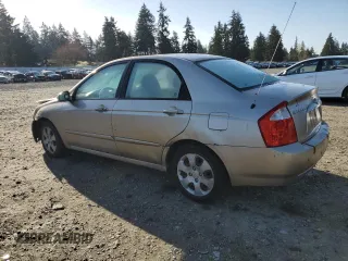 2006 Kia Spectra EX with VIN KNAFE122X65278395, listed as a Copart auction lot 51773205 with 243,978 mi miles and Salvage Title. Bid and sale history available at carsss.com. Image 2.