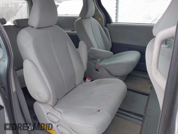 2012 Toyota Sienna with VIN 5TDKA3DC3CS010468, listed as a IAAI auction lot 41542523 with 56,055 mi miles and . Bid and sale history available at DreamBid. Image 8.