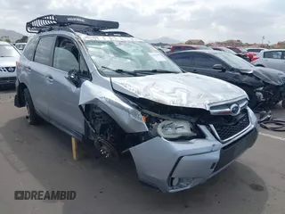 2014 Subaru Forester XT Touring with VIN JF2SJGPC2EH458390, listed as a IAAI auction lot 41923959 with 113,170 mi miles and . Bid and sale history available at DreamBid. Image 6.