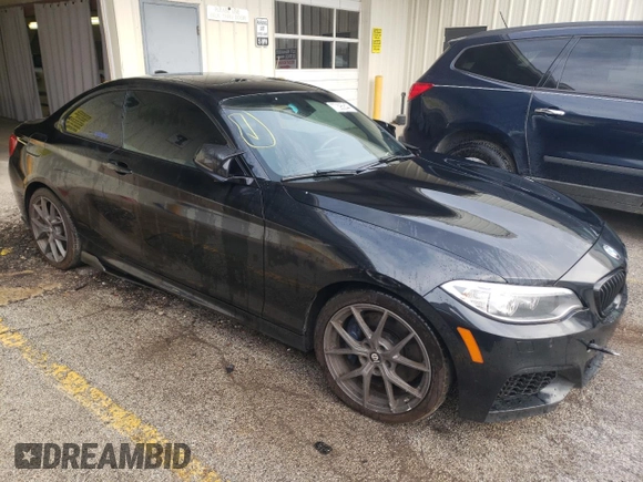 2015 BMW 2 Series M235i xDrive with VIN WBA1J9C53FV371160, listed as a Copart auction lot 77395844 with 148,064 mi miles and Clean Title. Bid and sale history available at carsss.com. Image 4.