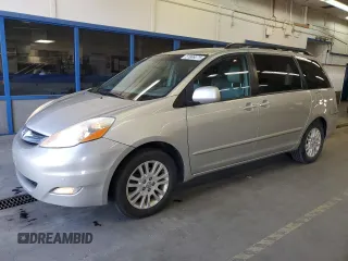2010 Toyota Sienna XLE with VIN 5TDYK4CC0AS309461, listed as a Copart auction lot 51869275 with 156,598 mi miles and Salvage Title. Bid and sale history available at carsss.com. Image 1.