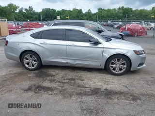 2014 Chevrolet Impala LT with VIN 2G1115SL4E9279660, listed as a IAAI auction lot 42675495 with 159,215 mi miles and . Bid and sale history available at DreamBid. Image 13.