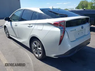 2017 Toyota Prius Two with VIN JTDKARFUXH3536565, listed as a IAAI auction lot 42374515 with 125,240 mi miles and . Bid and sale history available at DreamBid. Image 3.