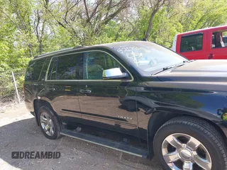 2015 Chevrolet Tahoe LTZ z VIN 1GNSKCKC8FR141163, wystawiony jako IAAI lot #42114008 z przebiegiem 221 804 mil mil oraz . Historia ofert i sprzedaży dostępna na DreamBid. Obrazek 13.