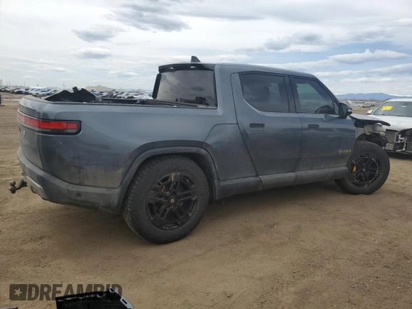 2023 Rivian R1T Adventure with VIN 7FCTGAAA3PN000801, listed as a Copart auction lot 51600895 with 19,486 mi miles and Salvage Title. Bid and sale history available at carsss.com. Image 3.