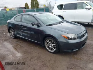2009 Scion tC with VIN JTKDE167690294023, listed as a IAAI auction lot 41898604 with 179,959 mi miles. Bid and sale history available at carsss.com. Image 1.