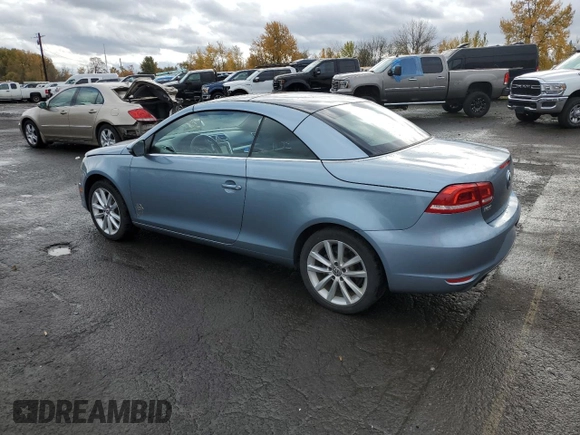 2013 Volkswagen Eos Komfort with VIN WVWBW8AH9DV007077, listed as a Copart auction lot 80254434 with 87,620 mi miles and Salvage Title. Bid and sale history available at DreamBid. Image 2.