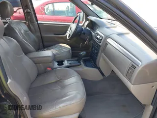 2001 Jeep Grand Cherokee Laredo with VIN 1J4GW48S31C558946, listed as a IAAI auction lot 42384392 with 252,393 mi miles and . Bid and sale history available at DreamBid. Image 5.