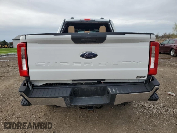 2023 Ford F-250 XL with VIN 1FT7W2BT9PED28983, listed as a Copart auction lot 51587385 with 29,364 mi miles and Salvage Title. Bid and sale history available at DreamBid. Image 6.