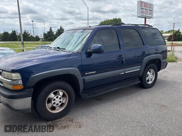 2002 Chevrolet Tahoe LS z VIN 1GNEC13Z92R180341, wystawiony jako Copart lot #59126715 z przebiegiem Nie podano mil oraz Czysty tytuł • Clean title. Historia ofert i sprzedaży dostępna na DreamBid. Obrazek 2.