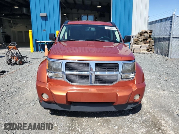 2007 Dodge Nitro SLT z VIN 1D8GU58K07W723331, wystawiony jako Copart lot #55169295 z przebiegiem 242 670 mil mil oraz Czysty tytuł • Clean title. Historia ofert i sprzedaży dostępna na DreamBid. Obrazek 5.