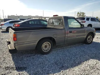 1995 Isuzu Pickup S z VIN JAACL11L8S7200788, wystawiony jako Copart lot #51145765 z przebiegiem 328 108 mil mil oraz Tytuł czysty. Historia ofert i sprzedaży dostępna na DreamBid. Obrazek 3.