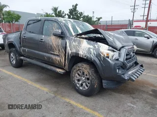 2017 Toyota Tacoma SR5 z VIN 3TMAZ5CN0HM039730, wystawiony jako IAAI lot #42406448 z przebiegiem 69 530 mil mil oraz . Historia ofert i sprzedaży dostępna na DreamBid. Obrazek 1.