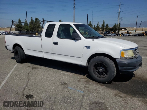 2003 Ford F-150 XL with VIN 1FTRX17W53NA54971, listed as a Copart auction lot 63686385 with 133,800 mi miles and Salvage title. Bid and sale history available at DreamBid. Image 4.