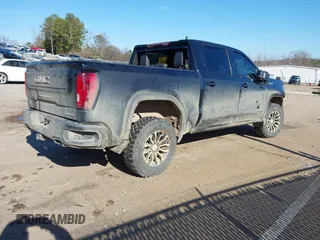 2021 GMC Sierra 1500 AT4 with VIN 1GTU9EET9MZ410854, listed as a IAAI auction lot 41307748 with 75,917 mi miles. Bid and sale history available at carsss.com. Image 4.