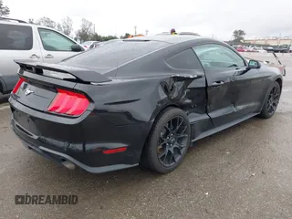 2018 Ford Mustang EcoBoost z VIN 1FA6P8TH3J5129088, wystawiony jako IAAI lot #41792548 z przebiegiem 55 991 mil mil oraz . Historia ofert i sprzedaży dostępna na DreamBid. Obrazek 4.
