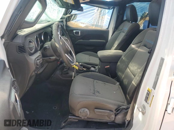 2022 Jeep Wrangler Unlimited Rubicon with VIN 1C4JJXR63NW206144, listed as a Copart auction lot 47234895 with 5,876 mi miles and Salvage title. Bid and sale history available at DreamBid. Image 7.