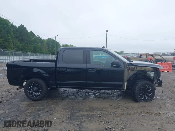 2019 Ford F-150 XL with VIN 1FTEW1C43KFC10164, listed as a IAAI auction lot 42342646 with 93,377 mi miles and . Bid and sale history available at DreamBid. Image 14.
