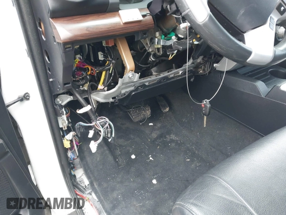 2019 Toyota Tundra SR5 z VIN 5TFHY5F17KX797348, wystawiony jako IAAI lot #41905558 z przebiegiem Nie podano mil oraz . Historia ofert i sprzedaży dostępna na DreamBid. Obrazek 6.