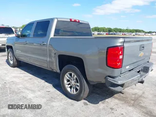 2017 Chevrolet Silverado 1500 LT with VIN 3GCPCREC1HG380406, listed as a IAAI auction lot 42031974 with 128,444 mi miles. Bid and sale history available at carsss.com. Image 3.
