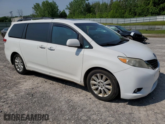 2011 Toyota Sienna XLE with VIN 5TDDK3DC4BS004280, listed as a Copart auction lot 59297345 with 173,890 mi miles and Salvage title. Bid and sale history available at DreamBid. Image 4.