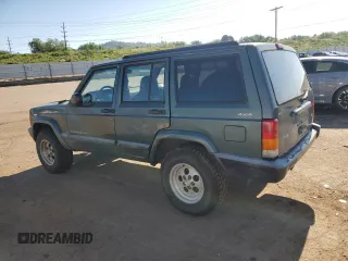 2000 Jeep Cherokee with VIN 1J4FF48S0YL198802, listed as a Copart auction lot 59996915 with 249,756 mi miles and Salvage title. Bid and sale history available at DreamBid. Image 2.