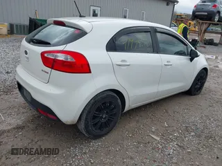 2012 Kia Rio EX with VIN KNADN5A31C6041521, listed as a IAAI auction lot 41994678 with 142,229 mi miles. Bid and sale history available at carsss.com. Image 4.