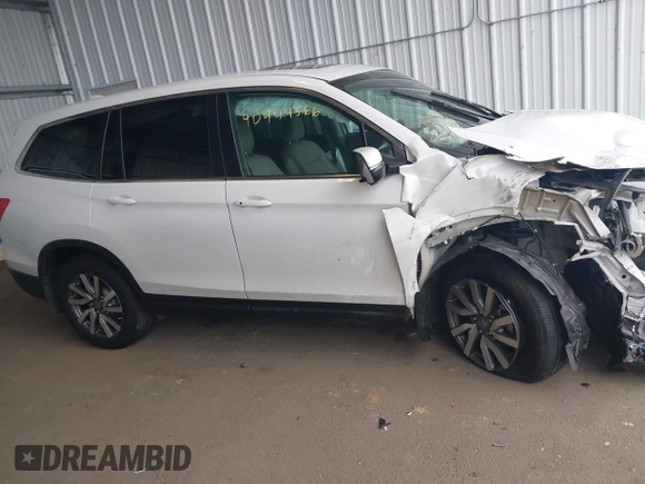 2022 Honda Pilot EX-L with VIN 5FNYF6H58NB097283, listed as a IAAI auction lot 40944566 with 22,027 mi miles and . Bid and sale history available at DreamBid. Image 13.