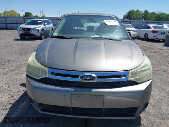 2009 Ford Focus SE with VIN 1FAHP35NX9W108176, listed as a IAAI auction lot 42094209 with 246,714 mi miles. Bid and sale history available at carsss.com. Image 6.