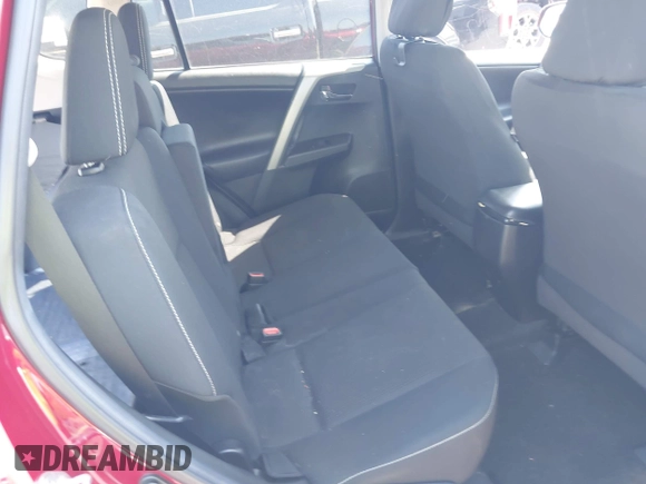 2018 Toyota RAV4 XLE with VIN 2T3WFREV8JW425464, listed as a IAAI auction lot 41977877 with 142,265 mi miles and . Bid and sale history available at carsss.com. Image 8.