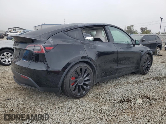2024 Tesla Model Y Performance with VIN 7SAYGDEF1RF028278, listed as a Copart auction lot 48900935 with 41,606 mi miles and Salvage Title. Bid and sale history available at DreamBid. Image 3.