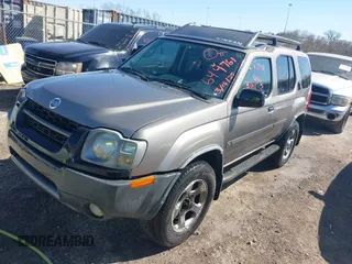 2004 Nissan Xterra XE with VIN 5N1ED28Y04C644761, listed as a IAAI auction lot 41767166 with 248,458 mi miles and . Bid and sale history available at DreamBid. Image 2.
