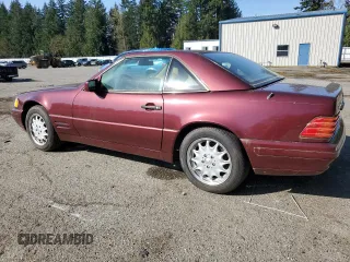 1997 Mercedes-Benz SL-Class with VIN WDBFA67F4VF148157, listed as a Copart auction lot 51943445 with Not Provided miles and Salvage Title. Bid and sale history available at carsss.com. Image 2.
