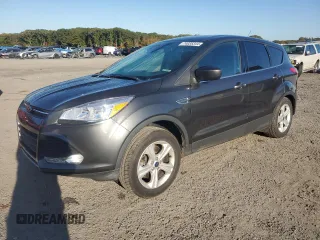 2016 Ford Escape SE with VIN 1FMCU9GX0GUB86582, listed as a Copart auction lot 74035344 with 115,538 mi miles and Salvage Title. Bid and sale history available at DreamBid. Image 1.