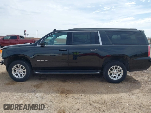 2018 GMC Yukon XL SLT with VIN 1GKS1GKC3JR223544, listed as a IAAI auction lot 41822836 with 164,430 mi miles and . Bid and sale history available at carsss.com. Image 15.