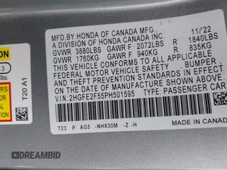2023 Honda Civic Sport with VIN 2HGFE2F55PH501595, listed as a IAAI auction lot 42355942 with 8,924 mi miles and . Bid and sale history available at DreamBid. Image 9.