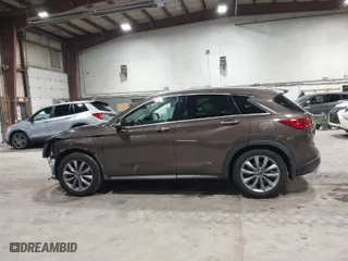 2019 Infiniti QX50 LUXE with VIN 3PCAJ5M36KF134096, listed as a IAAI auction lot 41851337 with 77,647 mi miles. Bid and sale history available at carsss.com. Image 14.