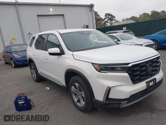 2023 Honda Pilot EX-L with VIN 5FNYG1H58PB016138, listed as a IAAI auction lot 40591717 with 10,068 mi miles and . Bid and sale history available at DreamBid. Image 1.