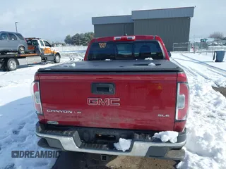2020 GMC Canyon 4WD SLE with VIN 1GTG6CEN1L1182177, listed as a IAAI auction lot 41524663 with 80,768 mi miles. Bid and sale history available at carsss.com. Image 16.