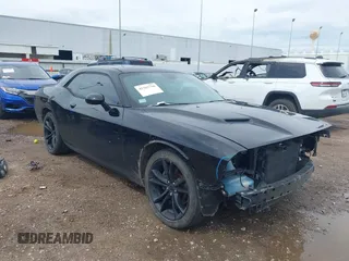2016 Dodge Challenger SXT with VIN 2C3CDZAG3GH337340, listed as a IAAI auction lot 42263750 with 104,766 mi miles and . Bid and sale history available at DreamBid. Image 1.