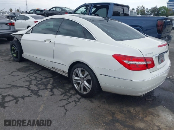 2010 Mercedes-Benz E E 350 with VIN WDDKJ5GB0AF005357, listed as a IAAI auction lot 42020474 with 133,117 mi miles. Bid and sale history available at carsss.com. Image 3.