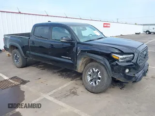 2023 Toyota Tacoma SR5 z VIN 3TMDZ5BN4PM167921, wystawiony jako IAAI lot #42115532 z przebiegiem 26 413 mil mil oraz . Historia ofert i sprzedaży dostępna na DreamBid. Obrazek 1.