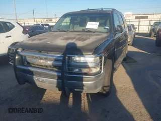 2006 Chevrolet Tahoe LT with VIN 1GNEC13TX6R114737, listed as a IAAI auction lot 41385454 with 131,234 mi miles. Bid and sale history available at carsss.com. Image 2.