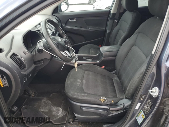 2012 Kia Sportage LX z VIN KNDPB3A29C7240993, wystawiony jako Copart lot #61408165 z przebiegiem 171 453 mil mil oraz Czysty tytuł • Clean title. Historia ofert i sprzedaży dostępna na DreamBid. Obrazek 7.