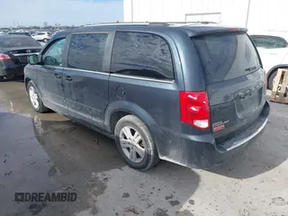 2013 Dodge Grand Caravan Crew with VIN 2C4RDGDG9DR740086, listed as a IAAI auction lot 41362852 with 145,881 mi miles and . Bid and sale history available at DreamBid. Image 3.